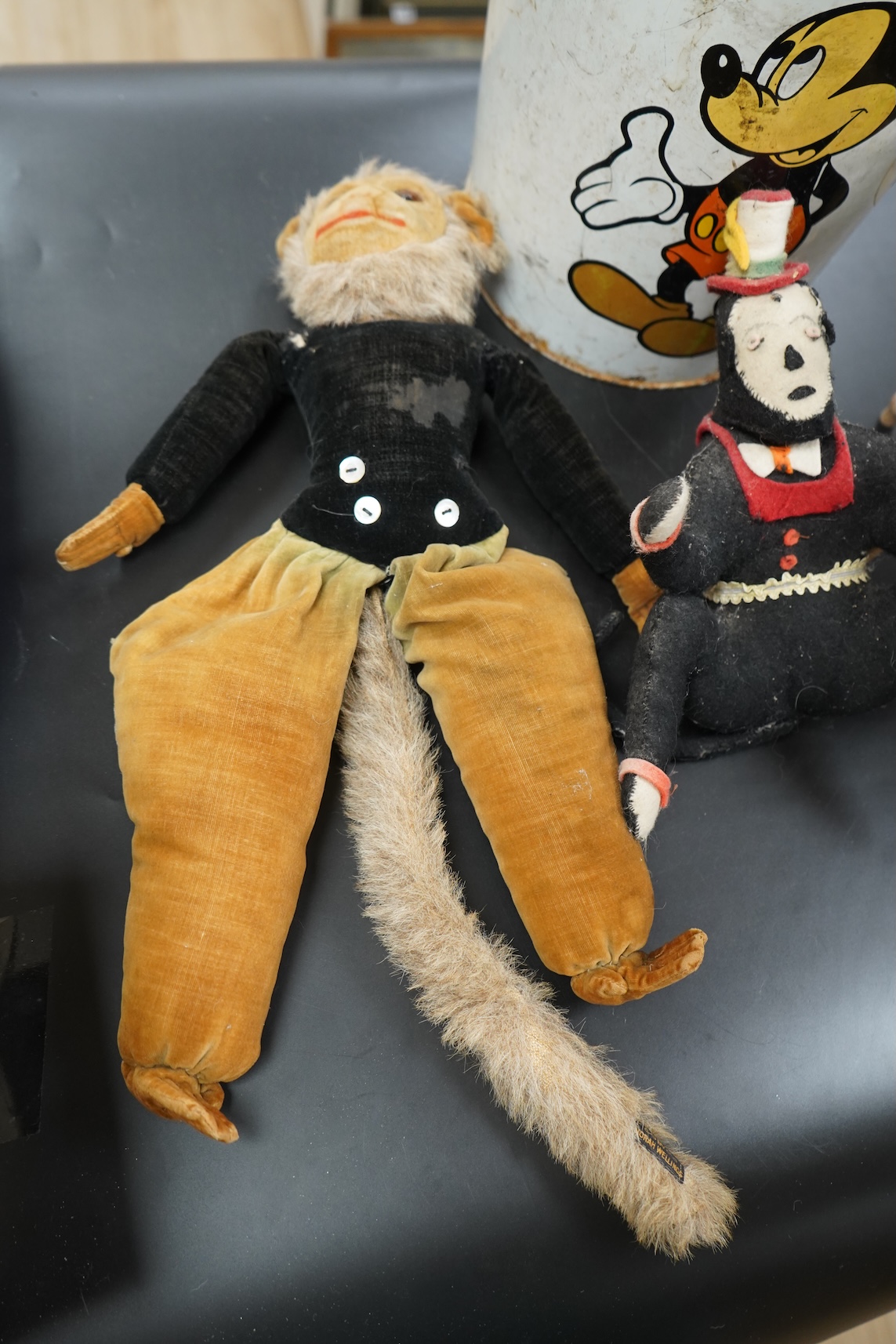 Two Nora Welling monkey soft toys, largest 38cm long and another felt made monkey together with a miniature Windsor chair and Disney Micky Mouse metal waste bin